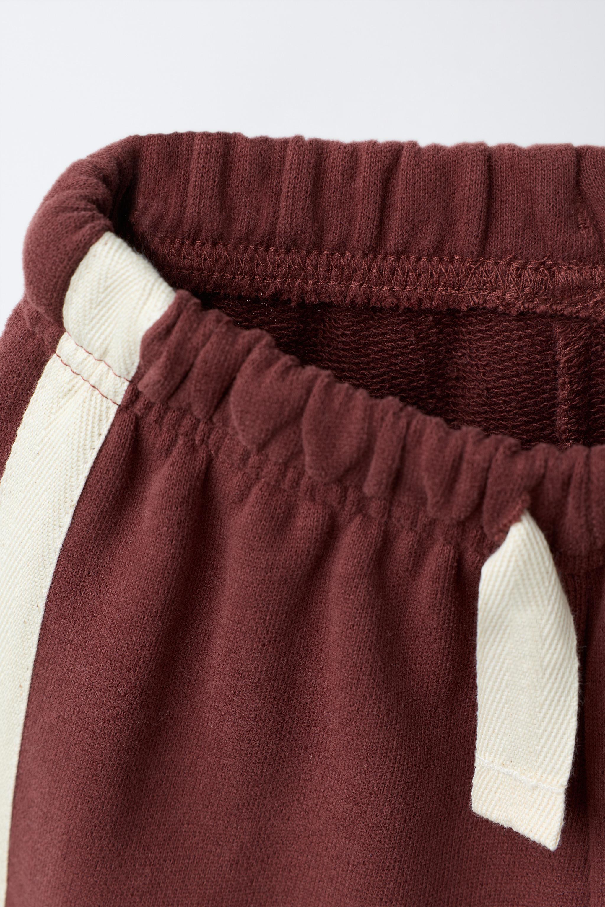 PANTALON EN MOLLETON À BANDE LATÉRALE